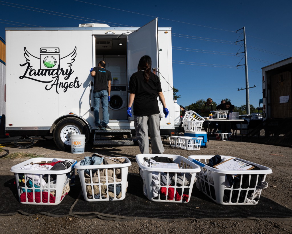 Multiple baskets of laundry ready for the mobile service